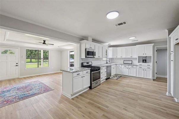 Interior, Kitchen, Recessed Lighting, Stainless Steel Appliances, Wood Texture Flooring