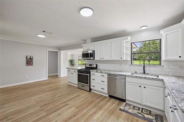 Interior, Kitchen, Recessed Lighting, Stainless Steel Appliances, Wood Texture Flooring