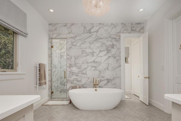 Bathroom, Free Standing Baths, Glass Shower, Interior, Marble Walls, Recessed Lighting, Wood Texture Flooring