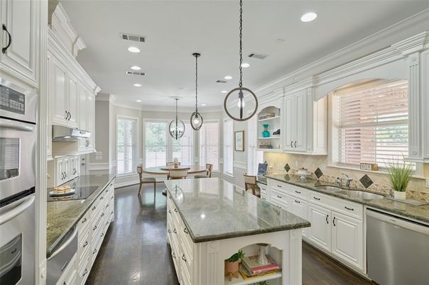 Dining room, Interior, Kitchen, Pendant Lights, Recessed Lighting, Stainless Steel Appliances, Wood Texture Flooring