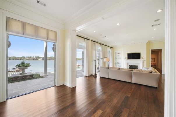 Fireplace, Interior, Living room, Recessed Lighting, Water, Wood Texture Flooring