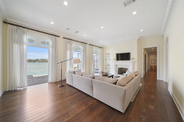 Fireplace, Interior, Living room, Recessed Lighting, Water, Wood Texture Flooring