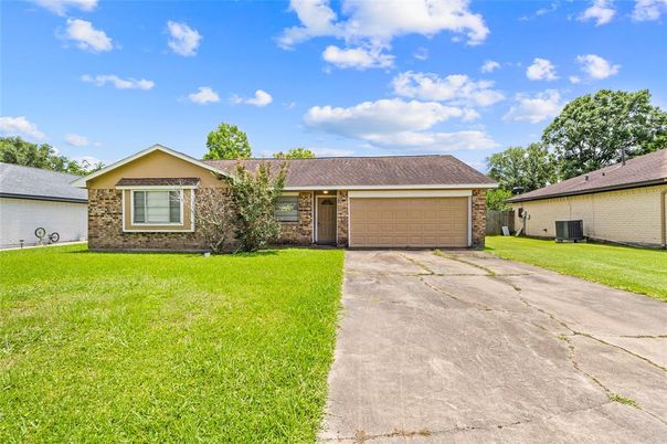 Attached, Backyard, Exterior, Facade, Brick Facade, Ranch