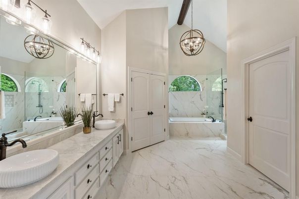 Bathroom, Chandelier, Dual Sink Vanities, Glass Shower, Interior, Marble, Marble Walls, Pendant Lights