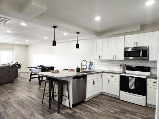 Interior, Kitchen, Pendant Lights, Recessed Lighting, Stainless Steel Appliances, Wood Texture Flooring