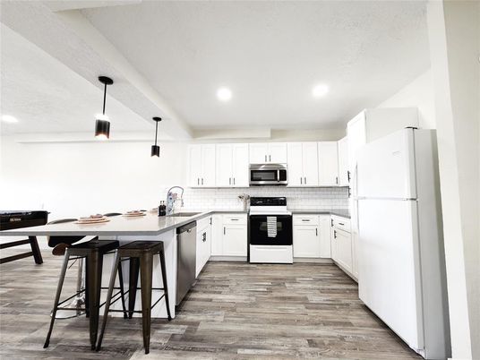Interior, Kitchen, Pendant Lights, Recessed Lighting, Stainless Steel Appliances, Wood Texture Flooring