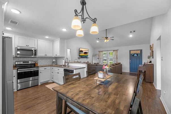 Dining room, Interior, Kitchen, Recessed Lighting, Stainless Steel Appliances, Wood Texture Flooring