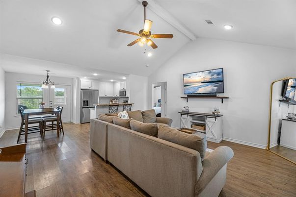 Dining room, Interior, Kitchen, Living room, Pendant Lights, Recessed Lighting, Stainless Steel Appliances, Wood Texture Flooring