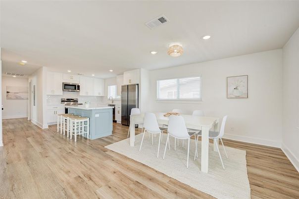Dining room, Interior, Kitchen, Recessed Lighting, Stainless Steel Appliances, Wood Texture Flooring