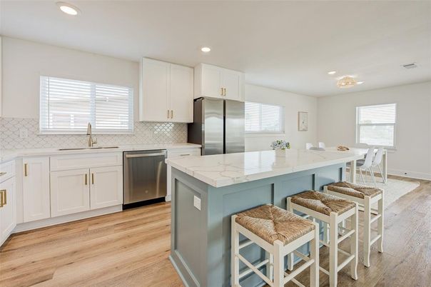 Dining room, Interior, Kitchen, Recessed Lighting, Stainless Steel Appliances, Wood Texture Flooring