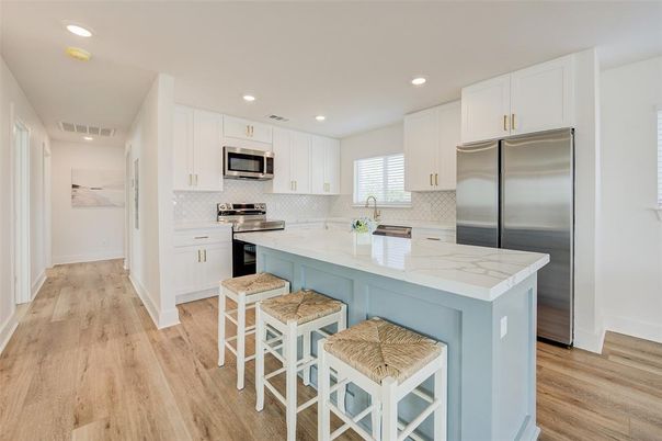 Interior, Kitchen, Recessed Lighting, Stainless Steel Appliances, Wood Texture Flooring