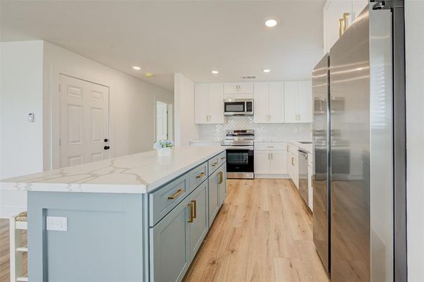 Interior, Kitchen, Recessed Lighting, Stainless Steel Appliances, Wood Texture Flooring