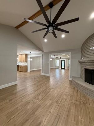 Empty room, Fireplace, Interior, Pendant Lights, Recessed Lighting, Wooden Beams, Wood Texture Flooring