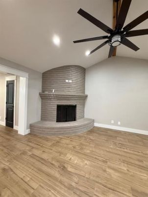 Empty room, Fireplace, Interior, Recessed Lighting, Wood Texture Flooring