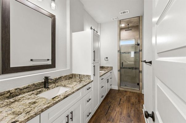 Bathroom, Dual Sink Vanities, Glass Shower, Interior, Wood Texture Flooring