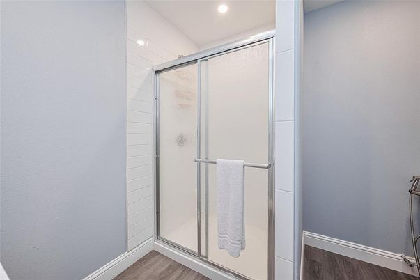 Bathroom, Glass Shower, Interior, Recessed Lighting, Wood Texture Flooring