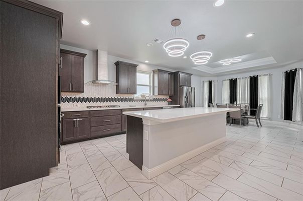 Dining room, Interior, Kitchen, Marble, Pendant Lights, Recessed Lighting, Stainless Steel Appliances