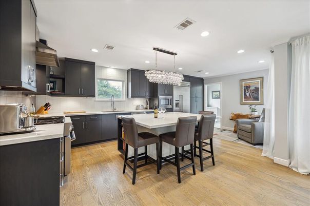 Chandelier, Interior, Kitchen, Recessed Lighting, Stainless Steel Appliances, Wood Texture Flooring