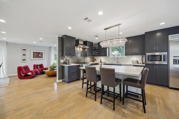 Chandelier, Interior, Kitchen, Recessed Lighting, Stainless Steel Appliances, Wood Texture Flooring
