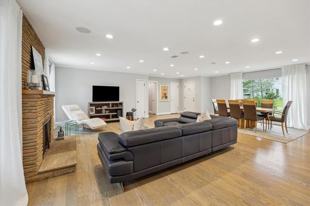 Dining room, Fireplace, Interior, Living room, Recessed Lighting, Wood Texture Flooring