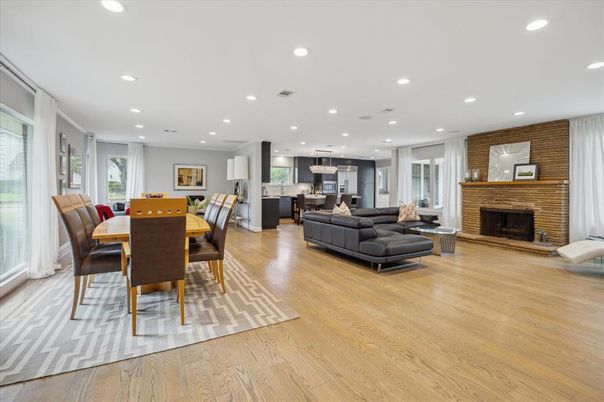 Dining room, Fireplace, Interior, Kitchen, Living room, Pendant Lights, Recessed Lighting, Stainless Steel Appliances, Stone Walls, Wood Texture Flooring