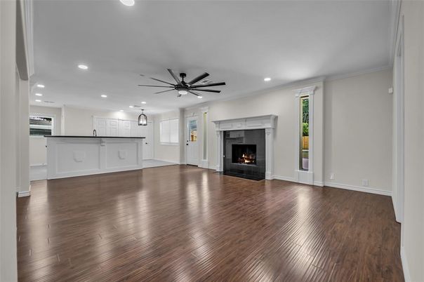 Empty room, Fireplace, Interior, Kitchen, Pendant Lights, Recessed Lighting, Wood Texture Flooring
