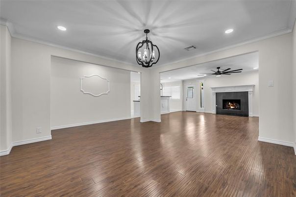 Empty room, Fireplace, Interior, Pendant Lights, Recessed Lighting, Wood Texture Flooring
