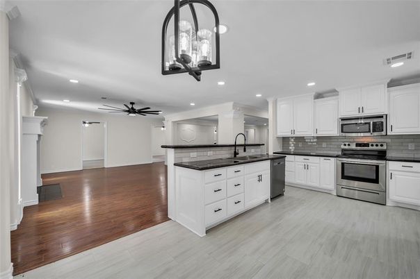 Interior, Kitchen, Recessed Lighting, Stainless Steel Appliances, Wood Texture Flooring
