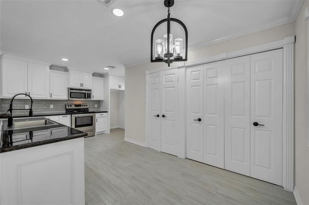 Interior, Kitchen, Pendant Lights, Recessed Lighting, Stainless Steel Appliances, Wood Texture Flooring