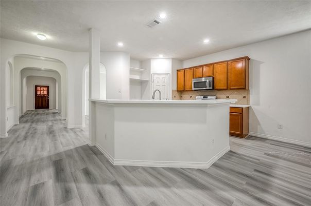 Interior, Kitchen, Recessed Lighting, Stainless Steel Appliances, Wood Texture Flooring