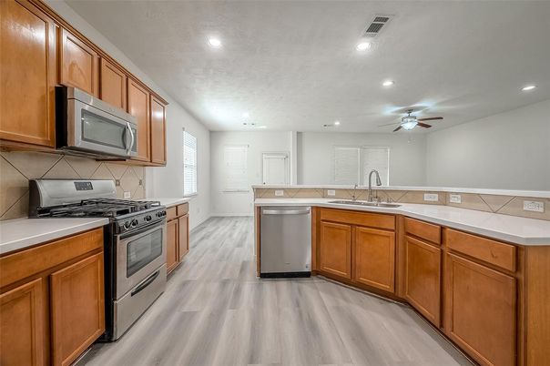 Interior, Kitchen, Recessed Lighting, Stainless Steel Appliances, Wood Texture Flooring