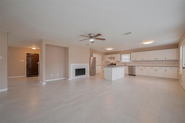 Empty room, Fireplace, Interior, Kitchen, Stainless Steel Appliances