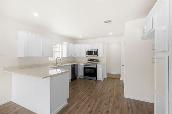 Interior, Kitchen, Recessed Lighting, Stainless Steel Appliances, Wood Texture Flooring