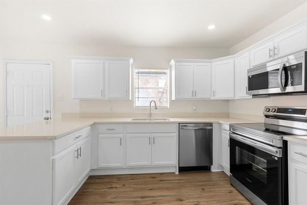 Interior, Kitchen, Recessed Lighting, Stainless Steel Appliances, Wood Texture Flooring