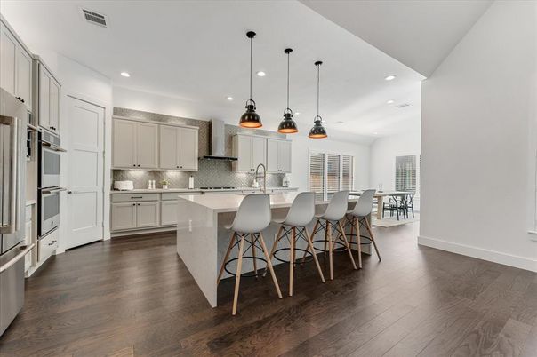 Dining room, Interior, Kitchen, Pendant Lights, Recessed Lighting, Stainless Steel Appliances, Wood Texture Flooring