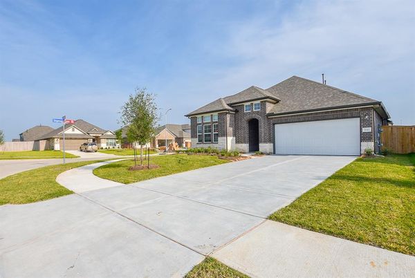 Attached, Backyard, Exterior, Facade, Brick Facade, Brick Traditional