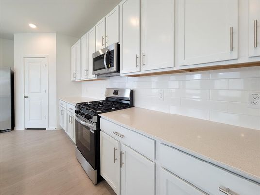 Interior, Kitchen, Recessed Lighting, Stainless Steel Appliances, Wood Texture Flooring