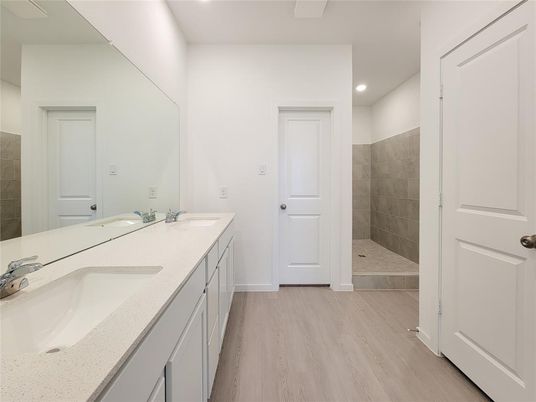 Bathroom, Dual Sink Vanities, Interior, Recessed Lighting, Wood Texture Flooring