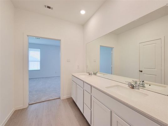 Bathroom, Dual Sink Vanities, Interior, Recessed Lighting, Wood Texture Flooring