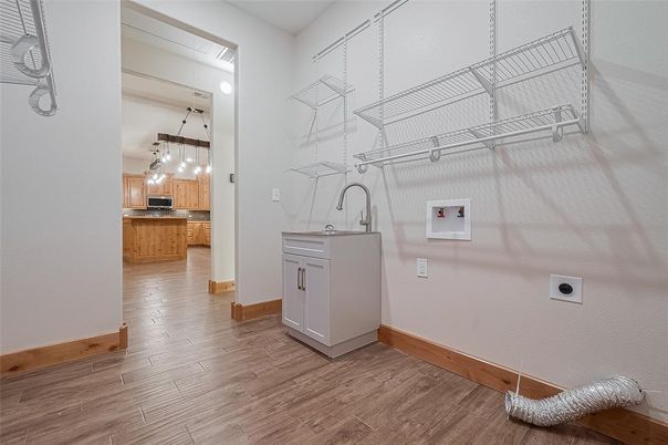 Interior, Kitchen, Pendant Lights, Utility Closets, Washer, Wood Texture Flooring