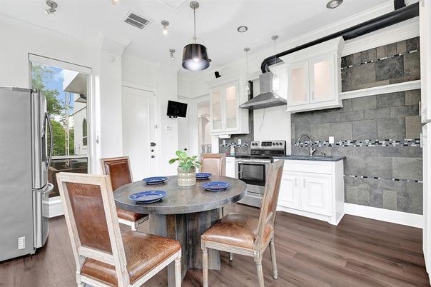 Dining room, Interior, Kitchen, Pendant Lights, Recessed Lighting, Stainless Steel Appliances, Wood Texture Flooring