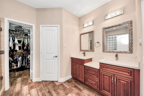 Bathroom, Dual Sink Vanities, Interior, Walk-in Closets, Wood Texture Flooring