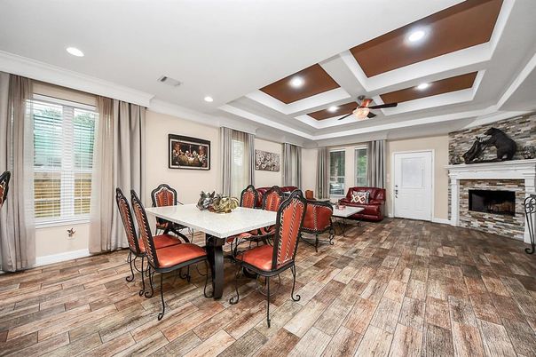 Dining room, Fireplace, Interior, Living room, Recessed Lighting, Wood Texture Flooring