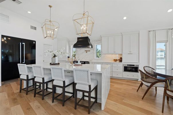 Interior, Kitchen, Marble Walls, Pendant Lights, Recessed Lighting, Wood Texture Flooring