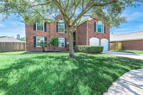 Attached, Backyard, Exterior, Facade, Brick Facade, Brick Traditional