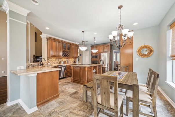 Chandelier, Dining room, Interior, Kitchen, Pendant Lights, Recessed Lighting, Stainless Steel Appliances