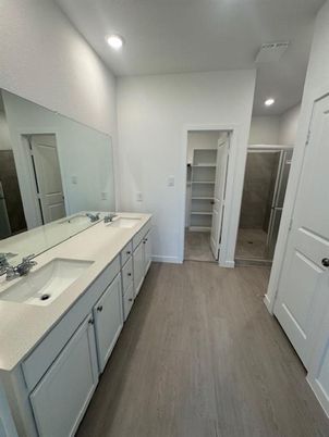Bathroom, Dual Sink Vanities, Interior, Recessed Lighting, Wood Texture Flooring