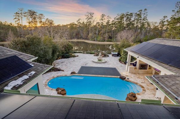 Exterior, Pool, Solar Panels