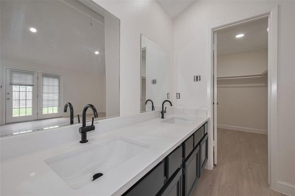 Bathroom, Dual Sink Vanities, Interior, Recessed Lighting, Wood Texture Flooring