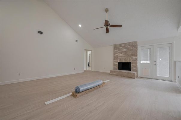 Empty room, Fireplace, Interior, Recessed Lighting, Wood Texture Flooring